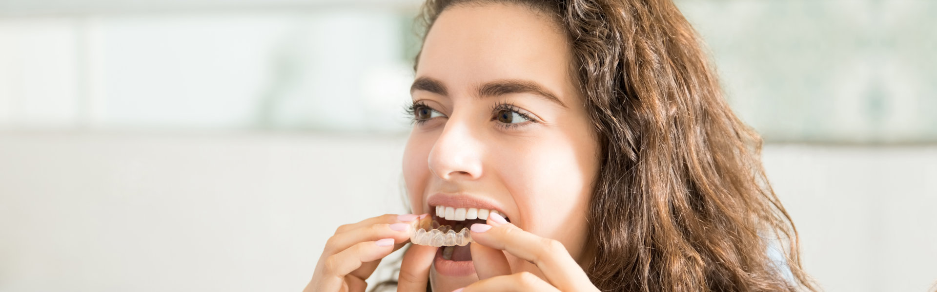 Young woman wearing invisalign